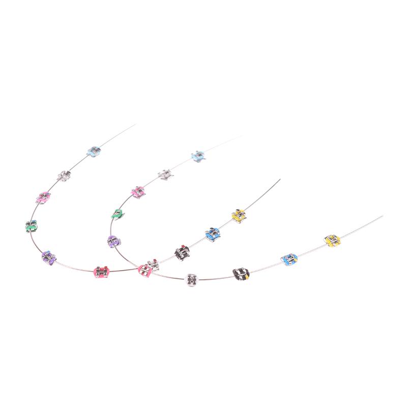 2 Stück Mode Split-Typ Mini Bunte Brackets Fake Zahnspangen Ohne Haken Temporäre Zahndekoration Metallbracket Zahnwerkzeug