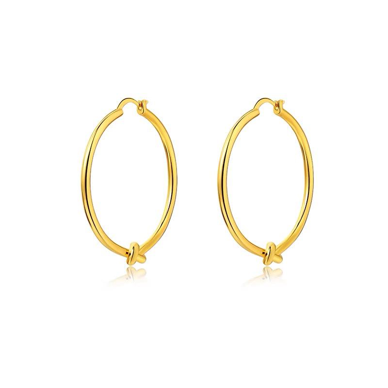 European & American Silver Knot Large Hoop Earrings for Women - High-End Gold Ear Cuffs with Unique, Elegant Design.