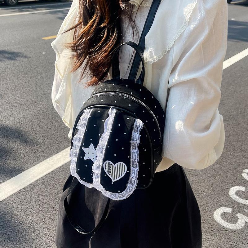 Schoolbag Korean version of sweet lace polka dot lop ear rabbit backpack girly style high value commuting foreign style fashion small backpack