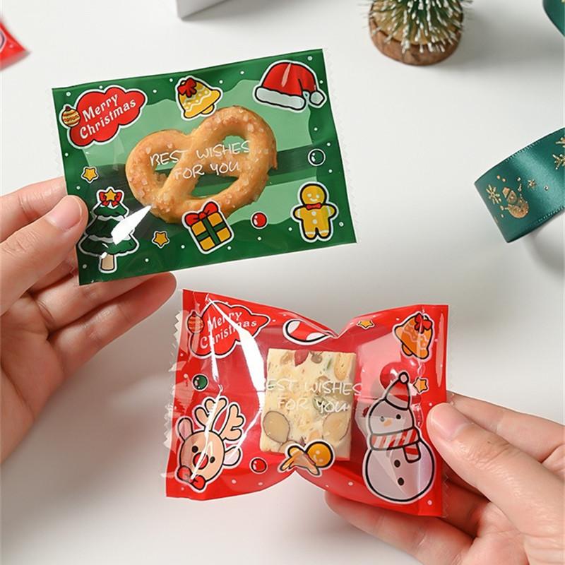 100Pcs 7x10cm Plastic Christmas Machine Sealed Bags Snowflake Pastry Candy Cookie Xmas Party Gift Packaging Supplies