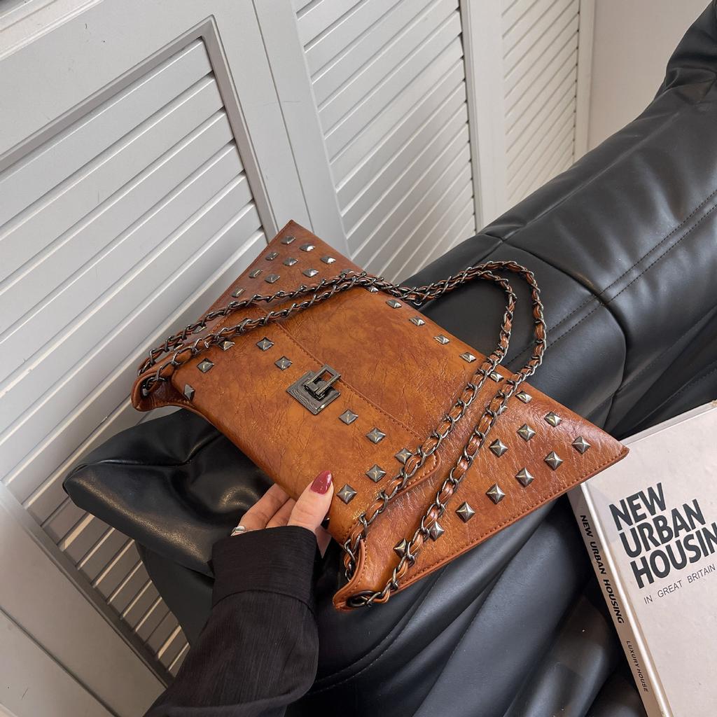 Retro rivet bag women's 2025 spring new textured chain portable shoulder messenger women's bag