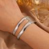 Stainless steel  women's opening C-shaped hollow irregular K gold-plated glossy  exaggerated and simple design arm ring