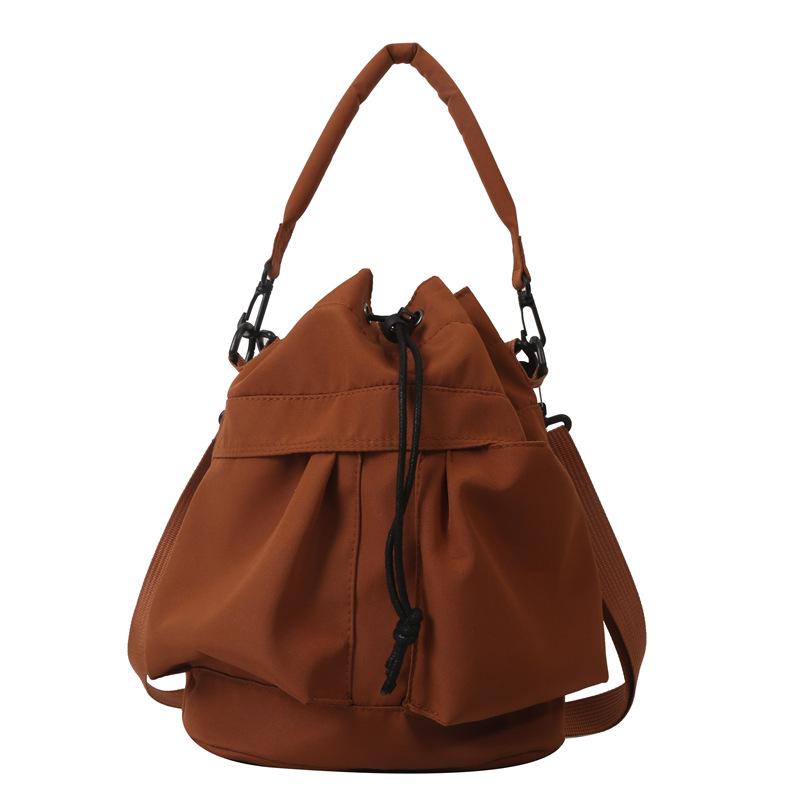 

Женская сумка через плечо из нейлона, водонепроницаемая, большой емкости, повседневная сумка с завязками на шнурке, сумка через плечо, сумка-тоут One size коричневый