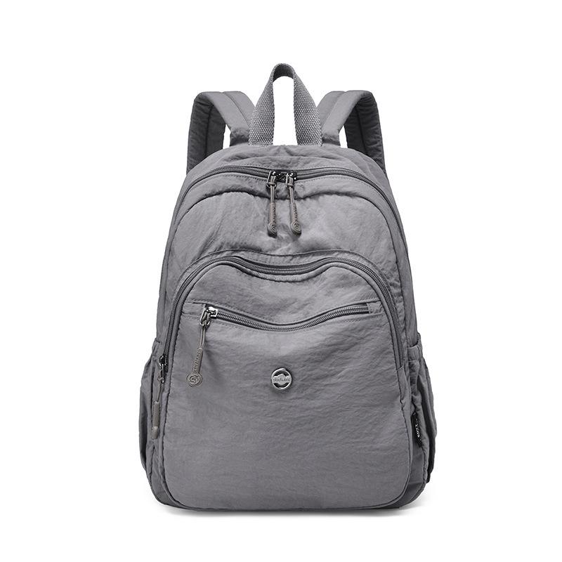 

Autumn new lightweight anti-splashing nylon women s large-capacity puff bag fashion niche women s backpack фиолетовый