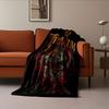 A Swirling Skeletal Design with Horns, Scythe, and Blood-like Accents. for All Seasons Blanket Lunch Break Throw Gift