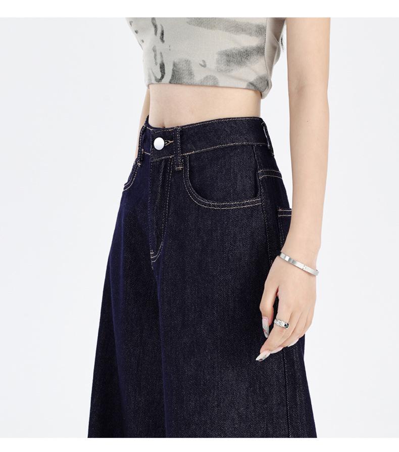 Dámské tmavě modré džíny s širokými nohavicemi až na zem - Kolekce léto 2025