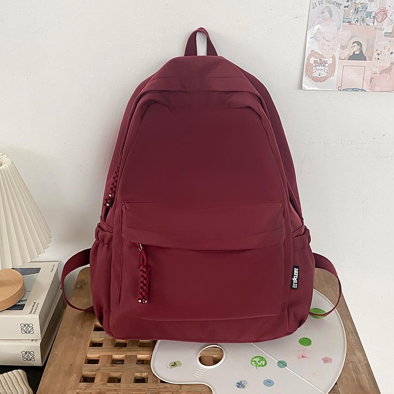 

Сумка великої ємності 2024 новий універсальний рюкзак жіночий портативний молодший школяр старшокласник шкільний рюкзак для відпочинку рюкзак червоний