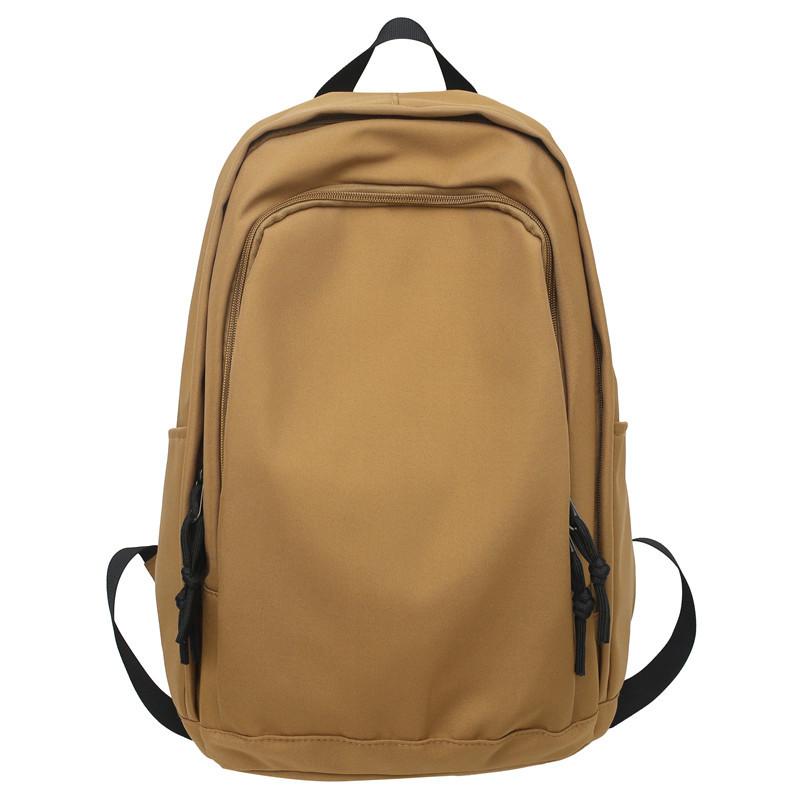 Spring new college style solid color student schoolbag Korean version large-capacity junior high school backpack