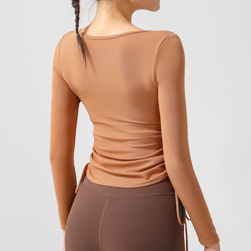 Autumn new tight yoga clothes top high-end sense with chest pad fitness long-sleeved women's drawstring pleated sports T-shirt