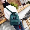 Women Mini Backpack Casual Travel School Bag Lightweight Daypack Small Shoulder Backpack with Front Pocket Tassel Pendant