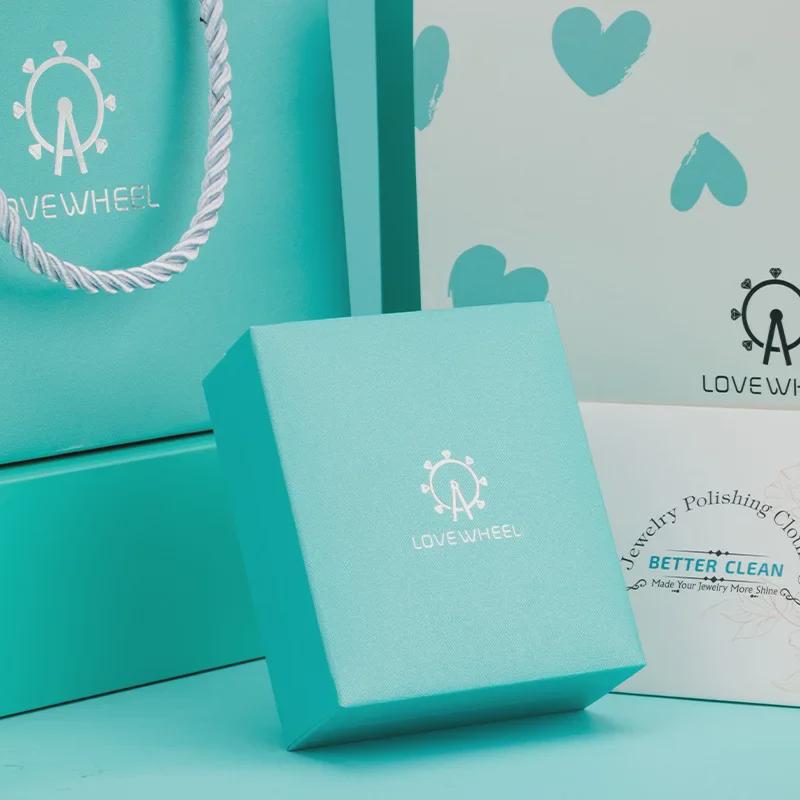 Ferris Wheel Gift Set: Box with Top/Bottom Cover, Envelope, Handbag, Jewelry Box, Silver Polishing Cloth.