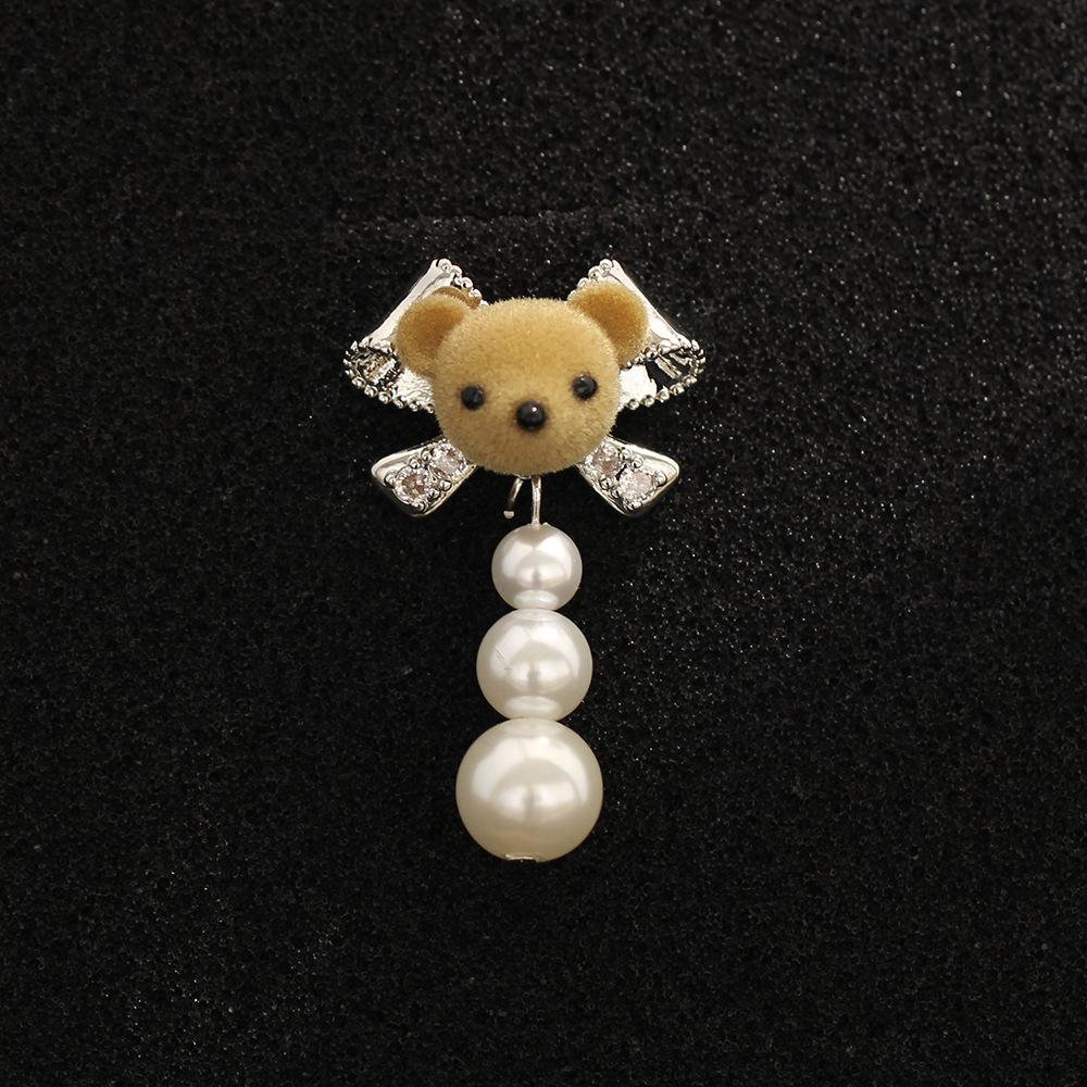 Korean version flocked bear bow brooch simple imitation pearl tassel versatile fixed buckle small collar pin women's accessories