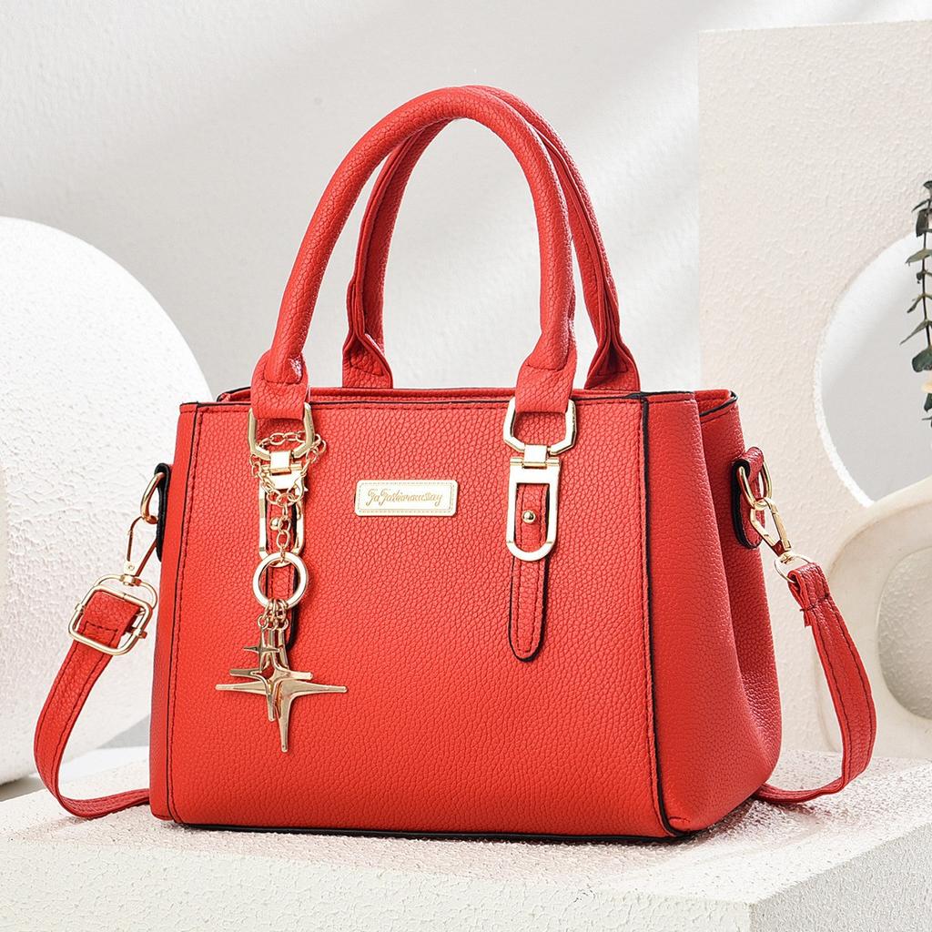 Simple and large-capacity hot-selling handheld women's bags 2026 new fashionable and versatile PU material single shoulder oblique span small