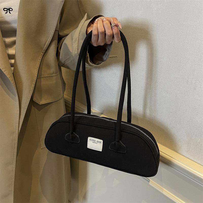 Autumn new niche retro underarm portable bowling bag simple large capacity underarm commuter bag