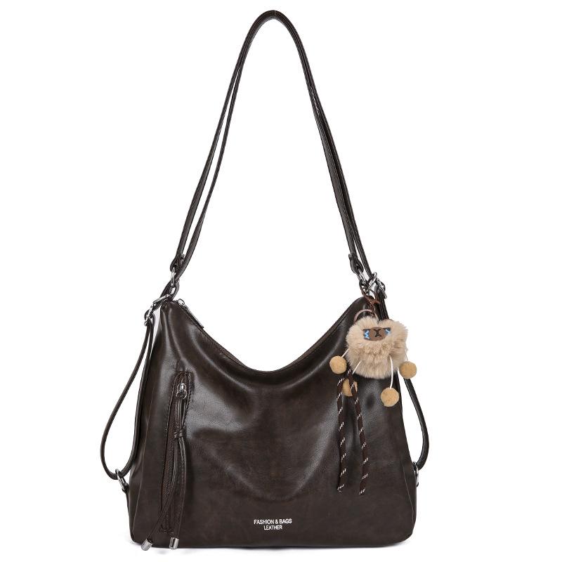 

Versatile Retro Women s Backpack: Large Capacity, Fashionable, Multifunctional Crossbody & Shoulder Bag кавовий