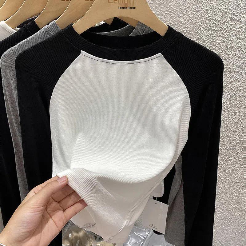 

Жіноча приталена футболка з рубчиком, з круглим вирізом та довгим рукавом, короткого стилю для весни 2024 - Трендний образ з високою талією XL (115-130 kg) чорний/білий