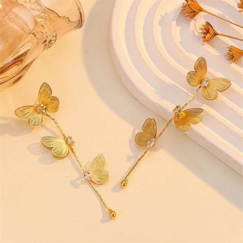 Long-flowing Tassel Butterfly Earrings for Women - Luxurious and High-end Ear Studs with Unique, Exaggerated and Grand Design.