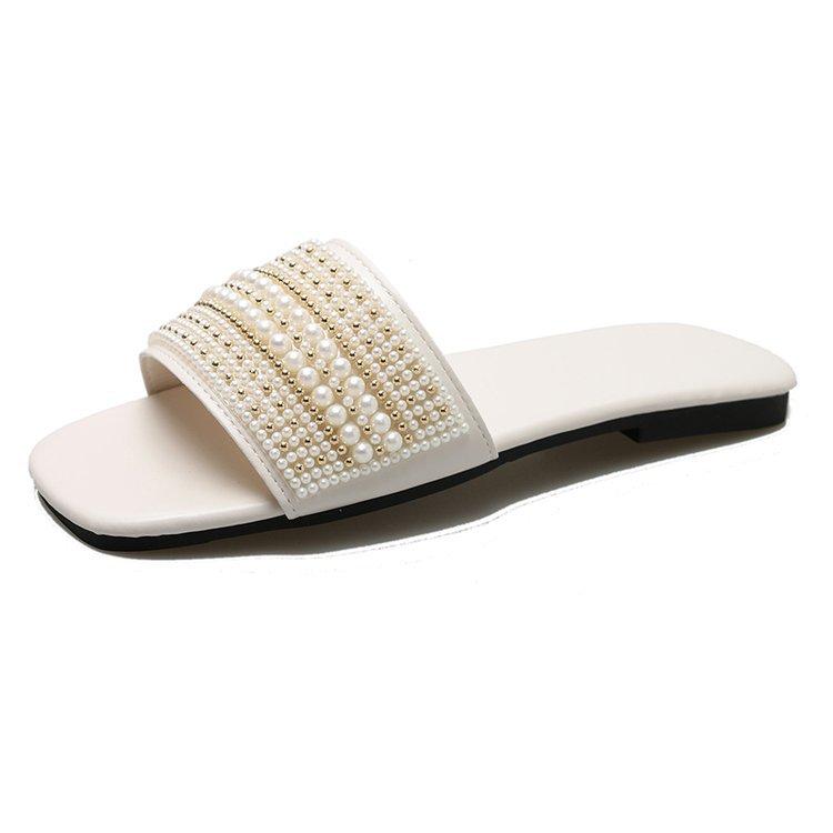 

Large size flat-bottomed slippers women s summer new pearl one-word lazy one-pedal soft-soled slippers outer wear 43