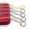 Vielseitiger Flaschenhalter für Beißringe mit Silikonband – Praktische und zuverlässige Befestigungsmöglichkeit für Beißringe am Kinderwagen oder Hochstuhl