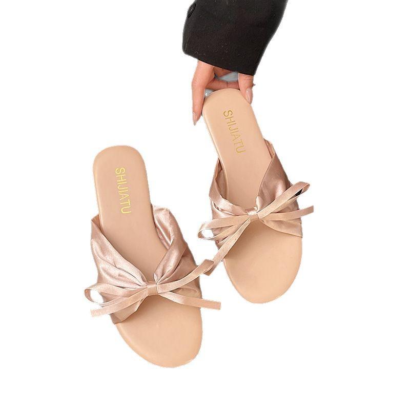 Korean version of fairy style elegant cool slippers 2025 new wear soft-soled bow shoes flat beach open toe cool