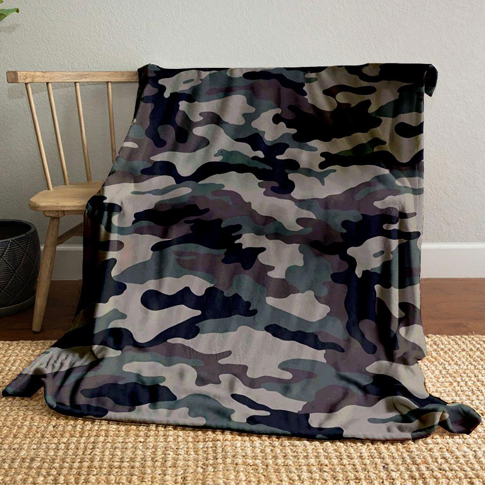 The image features a green, brown, black, and beige camouflage pattern. for all seasons blanket lunch break throw gift