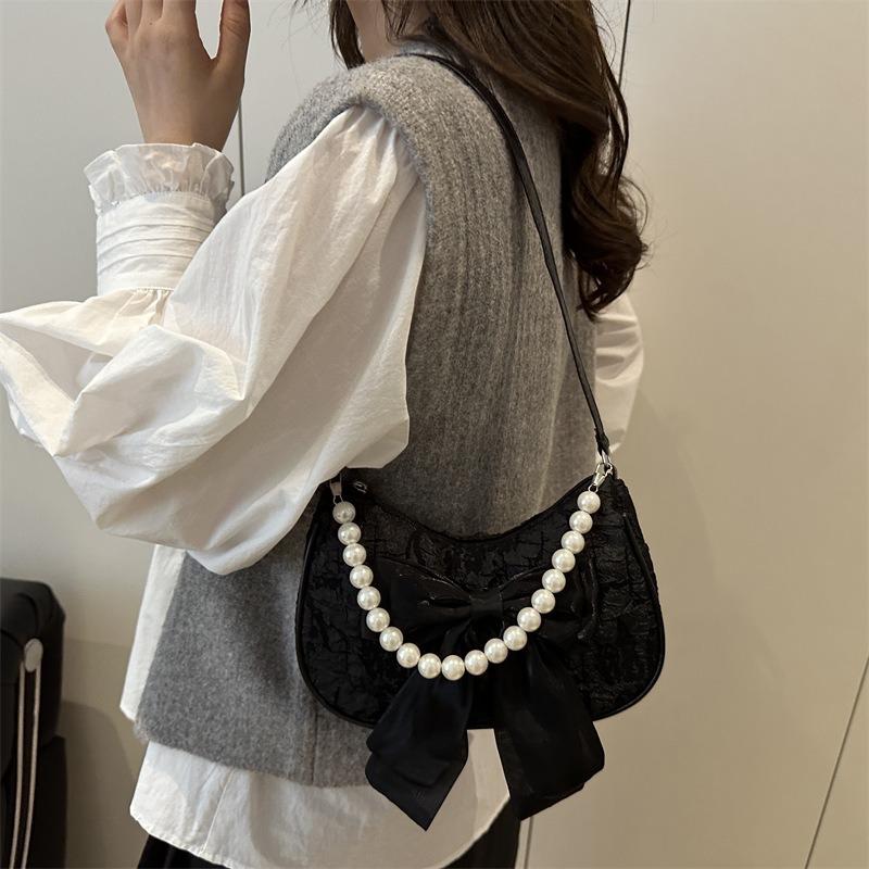 Popular design pearl handbag bag women's summer new messenger bag bow shoulder armpit bag