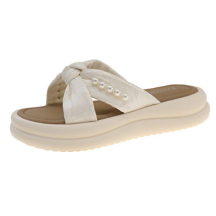 Gentle pearl Xiaoxiangfeng one-word slippers summer new sweet cool slippers women's skirt seaside beach shoes