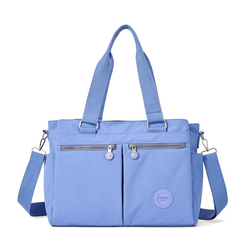 

Large Capacity Women Top-Handle bag Fashion Casual A4 Book Women Casual Tote High Quality Durable Fabric Female Shoulder Bag світло-синій колір