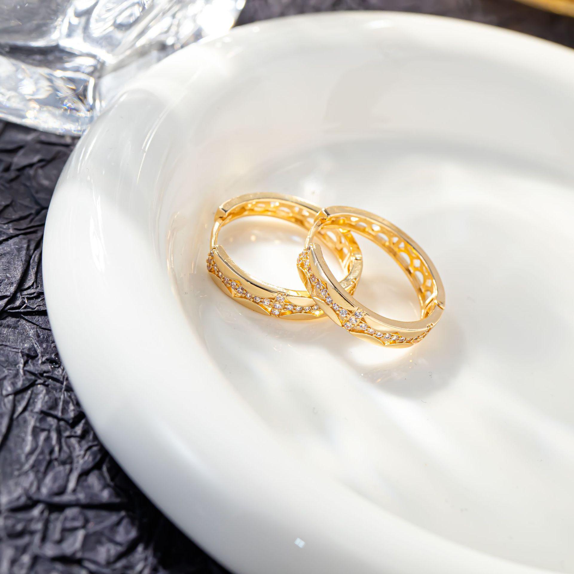 Korean Style Gold-Plated Zirconia Hoop Earrings with Hollow Wave Pattern