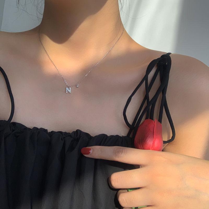 Geometric Pendant Necklace With Large And Small Squares