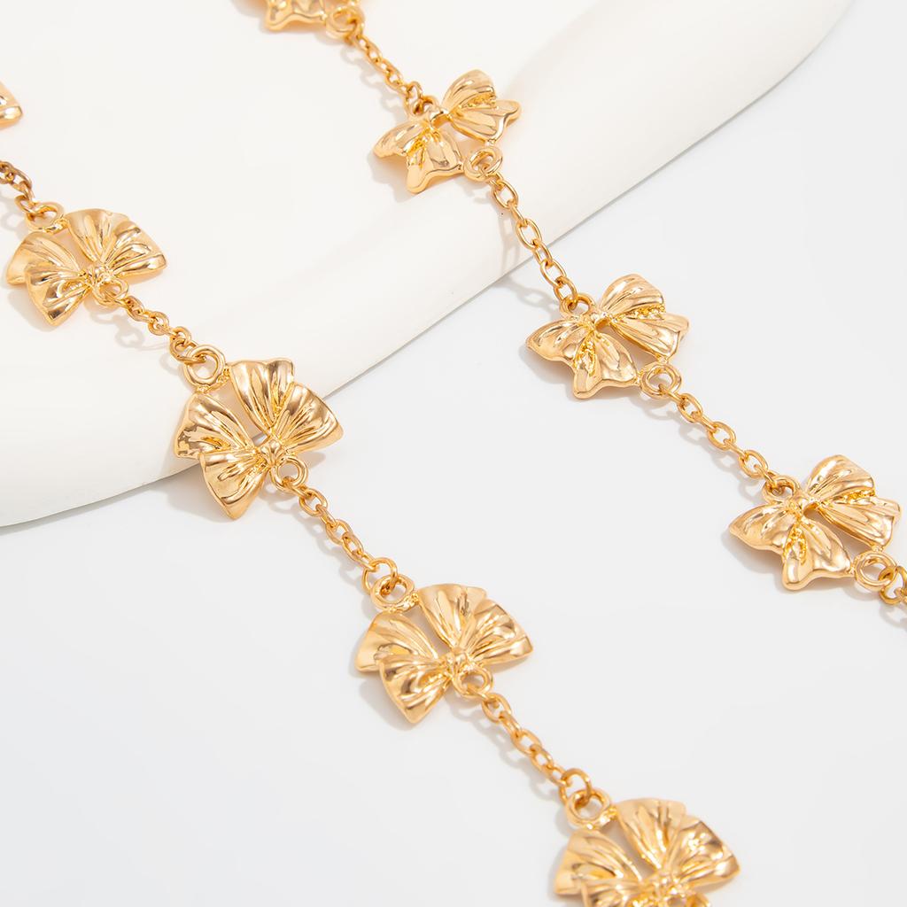 Temperament Fashion Bow Cross Necklace Simple Imitation Pearl Tassel Long Section Collarbone Chain