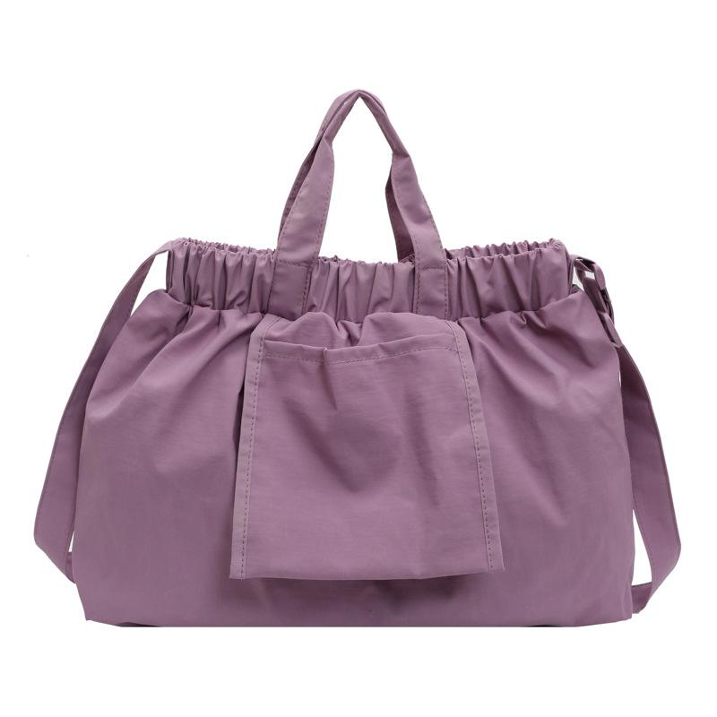 

Niche casual simple messenger bag bag elastic band design portable tote bag large capacity dopamine shoulder women s bag one size fits all фіолетовий