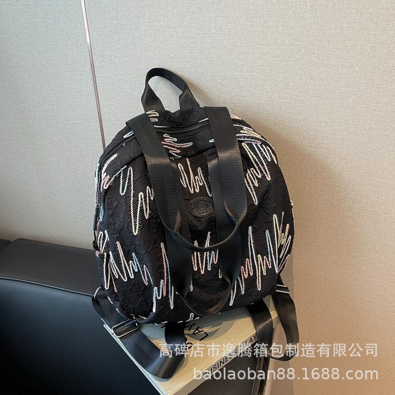 

Повсякденний високоякісний жіночий рюкзак великої місткості 2024 новий рюкзак у стилі коледжу, модний шкільний рюкзак чорний