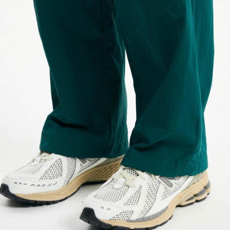New Balance Pants Lqj Nbnte12313 62 Common Flying 2 Way Warm Up Pants