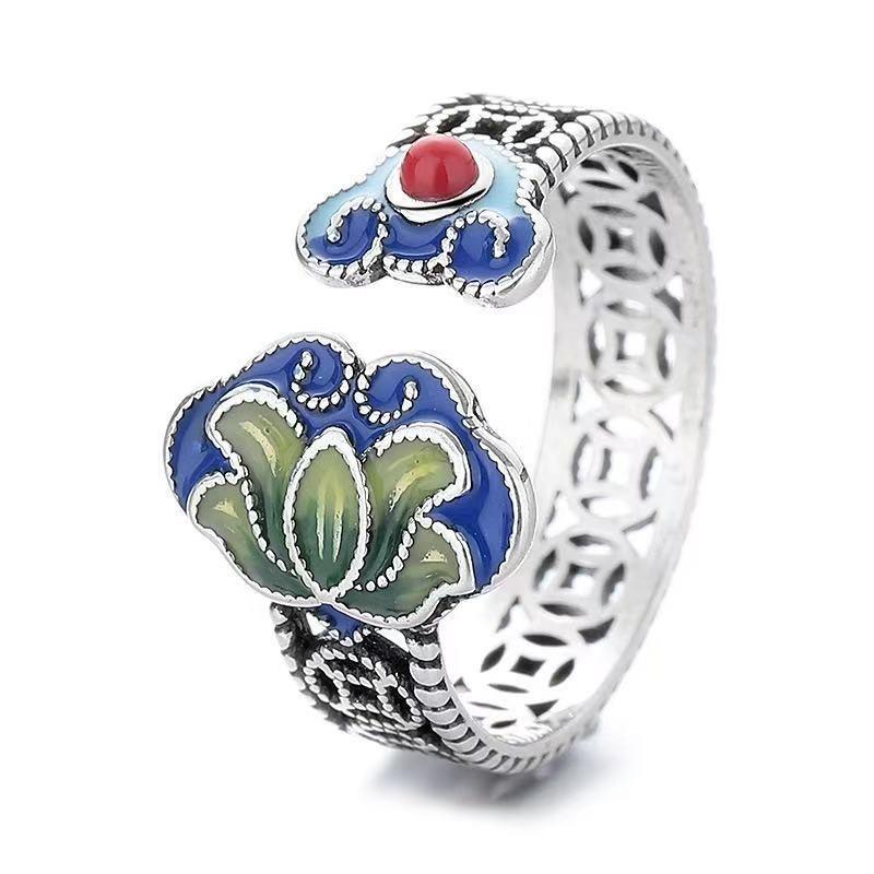 A retro-style hollowed-out blue lotus lock ring with a fashionable open ring featuring blue enamel craftsmanship