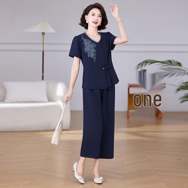 

Summer Outfit: Plus-Size Short Sleeve Top & Pants Set for Middle-Aged and Elderly Women 5XL темно-синього кольору