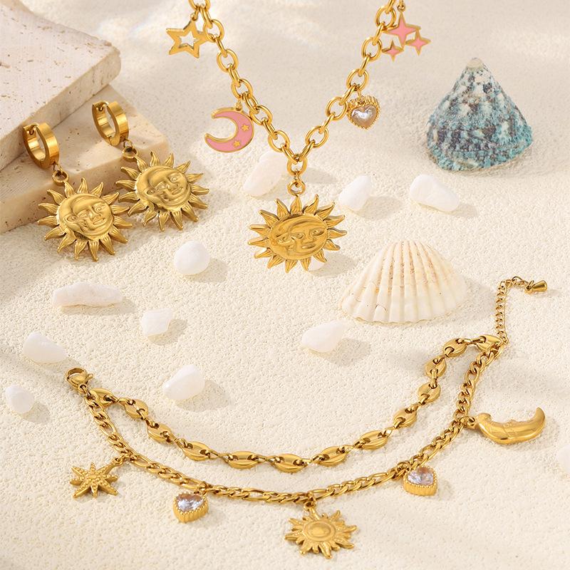 High-End Sun Portrait Titanium Stainless Steel Jewelry Set: Necklace, Bracelet, and Earrings in Light Luxury Design for Women.