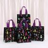 Bolsas StoBag temática navideña bolsas para envolver regalos bolsas para dulces bolsa tote de material no tejido negra colorida para empaquetar caramelos golosinas