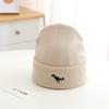 European and American children's autumn and winter knitted hats, boys' embroidered dinosaur standard warm wool hats, simple windproof hats