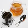Stainless steel tea strainer with lid and teaspoon, foldable handle design