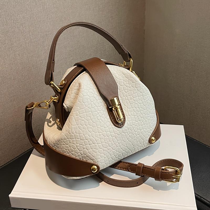 Luxury color-blocked crossbody bag, high-quality feel, stylish Western retro handbag, simple and suitable for commuting, elegant shoulder bag.