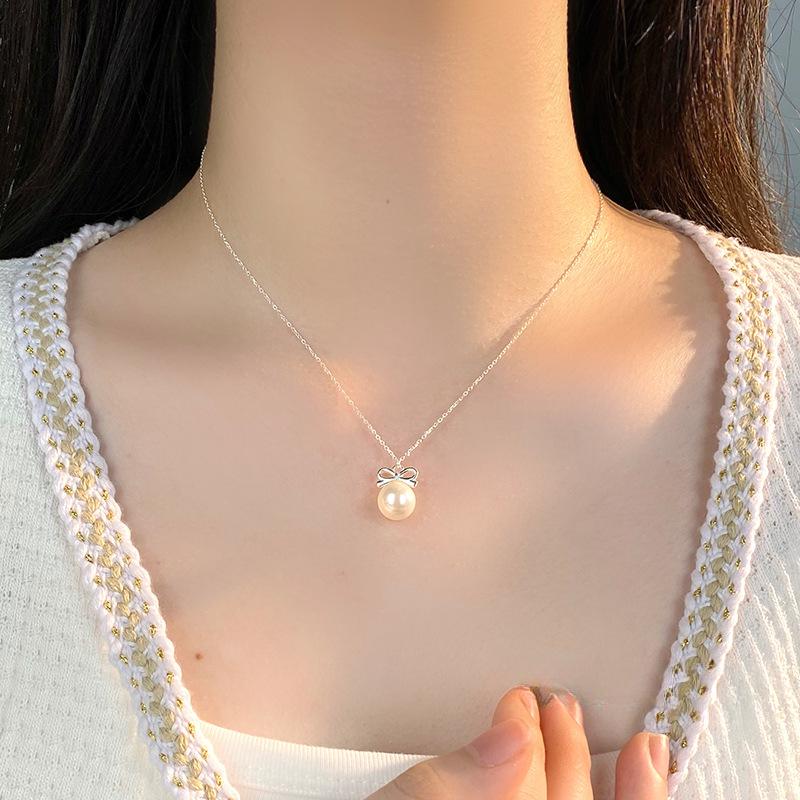 Sweet Butterfly Pearl Necklace for Women's Light Luxury and High Grade Feeling, Girls' Heart Design, and Neckwear