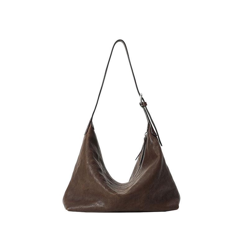 

Qiu Zhen Genuine Leather Hobo Bag – Versatile, High-End Shoulder Bag for Women
