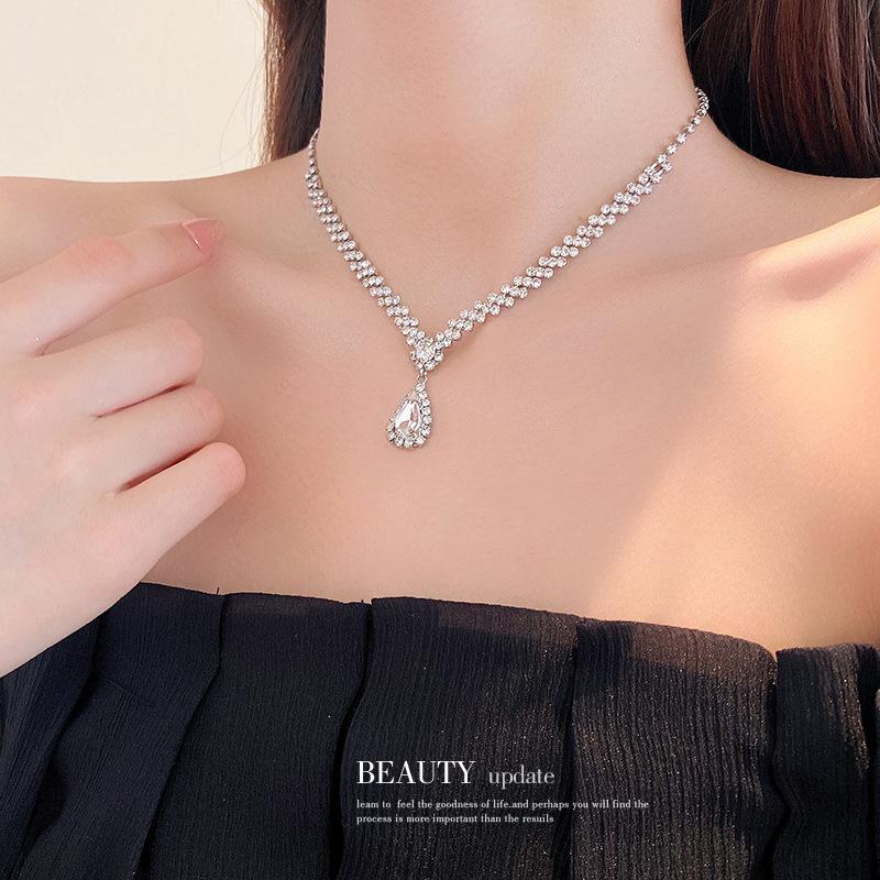 European and American diamond-encrusted water drop fringed necklace earrings two-piece set temperament collarbone chain necklace necklace women
