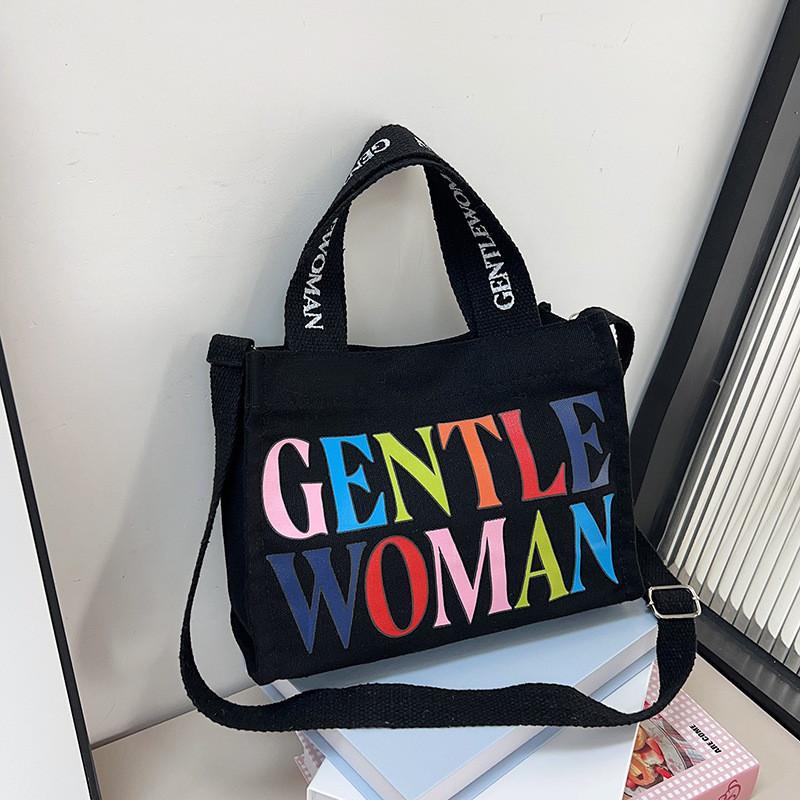 

Stylish Korean Canvas Tote Bag For Women Featuring Colorful Lettering And Cartoon Design чорний