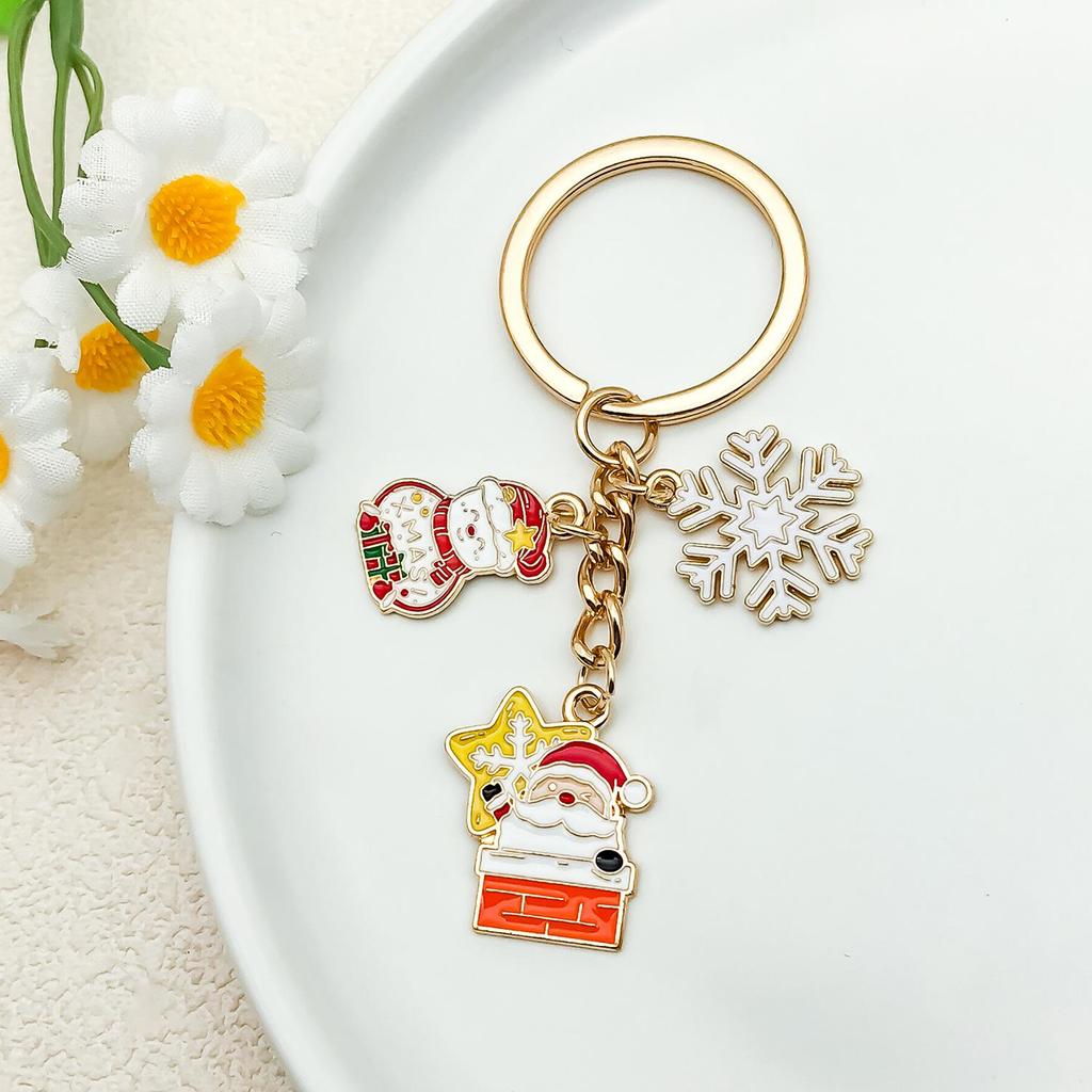 Elegant Christmas Keychain: Gold Snowflake & Snowman Pendant