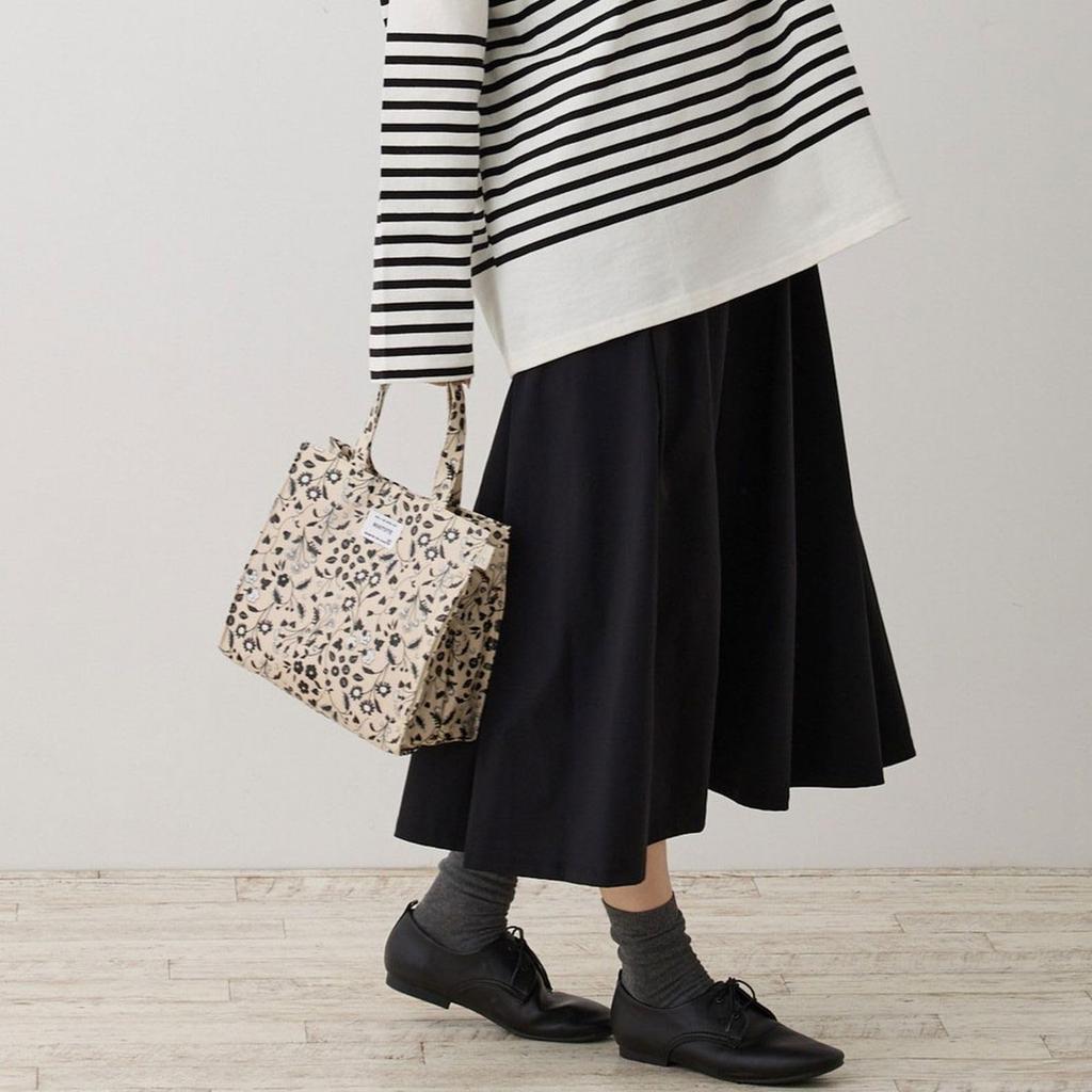 Laminated exterior, small, self-standing square tote bag