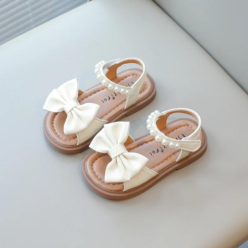 

Летние сандалии из кожи для девочек, мягкие с жемчугом, милые детские праздничные сандалии, шикарные открытые носки, детские туфли с бантиками 31 бежевый