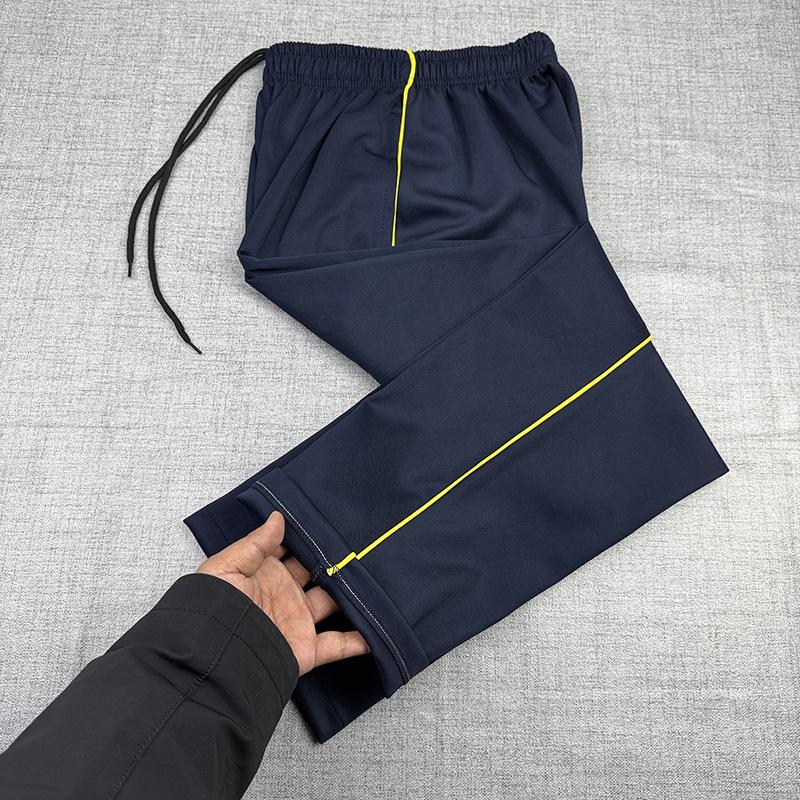 

Unisex Dark Blue School Trousers with Yellow Stripes - Loose, Straight-Leg for Students, Suitable for Spring, Summer, and Autumn. 5XL