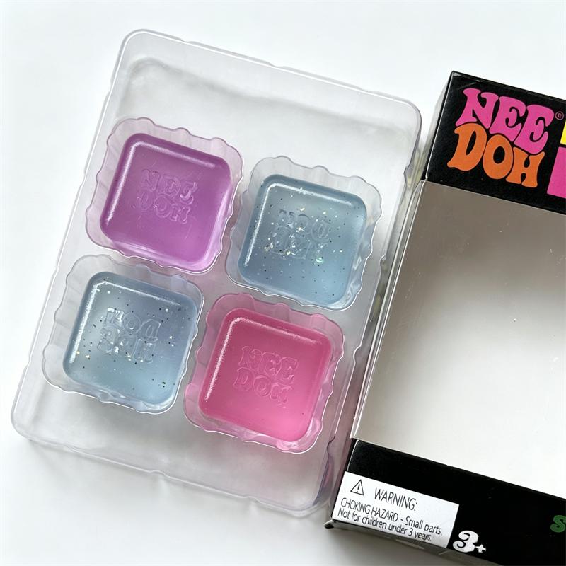Needoh Nice Ice Mini Paquete de 4 Cubo Juguete de Apretar Transparente Brillo Suave Squishy Alivio Presión Maltosa TPR No Tóxico Juguete Portátil Regalo